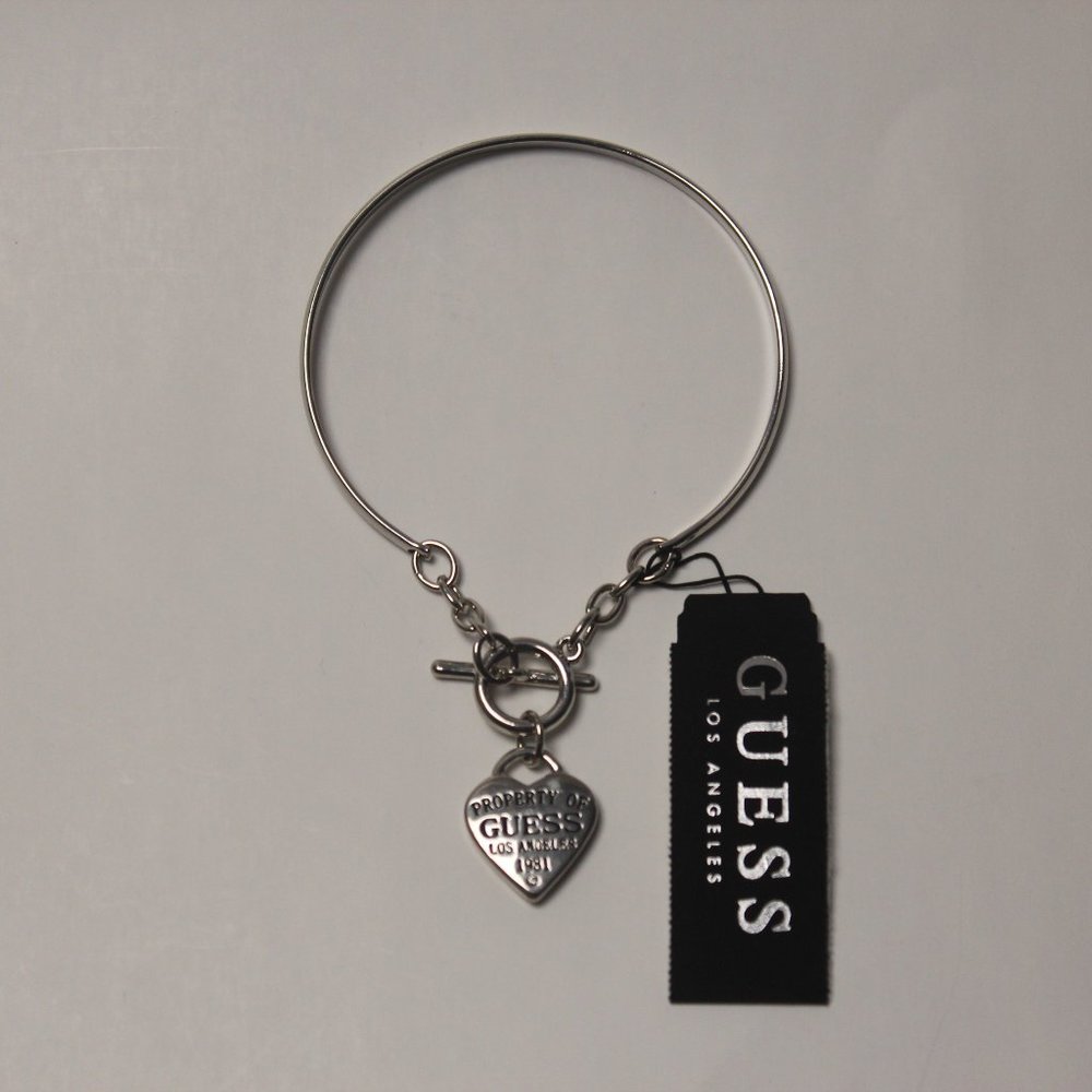 Guess women's Silver-Tone Logo Bangle bracelet